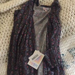 XS Lularoe Sarah. Black background with flowers